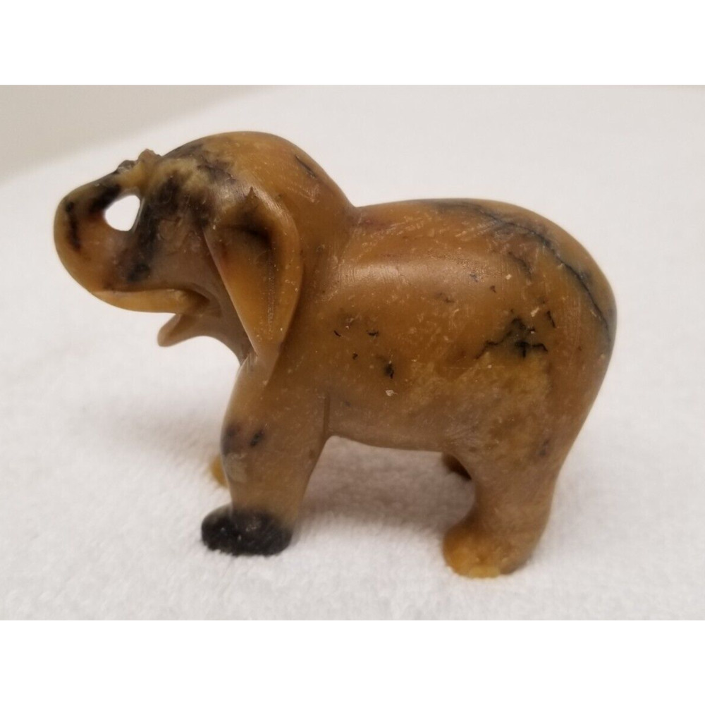 Elephant figurine 2 1/2 in. heavy stone smooth brown and black